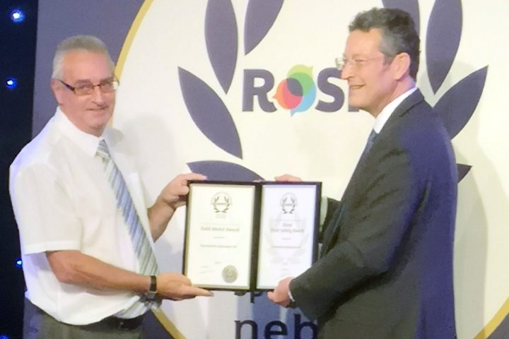 Billy Vance collecting ROSPA awards